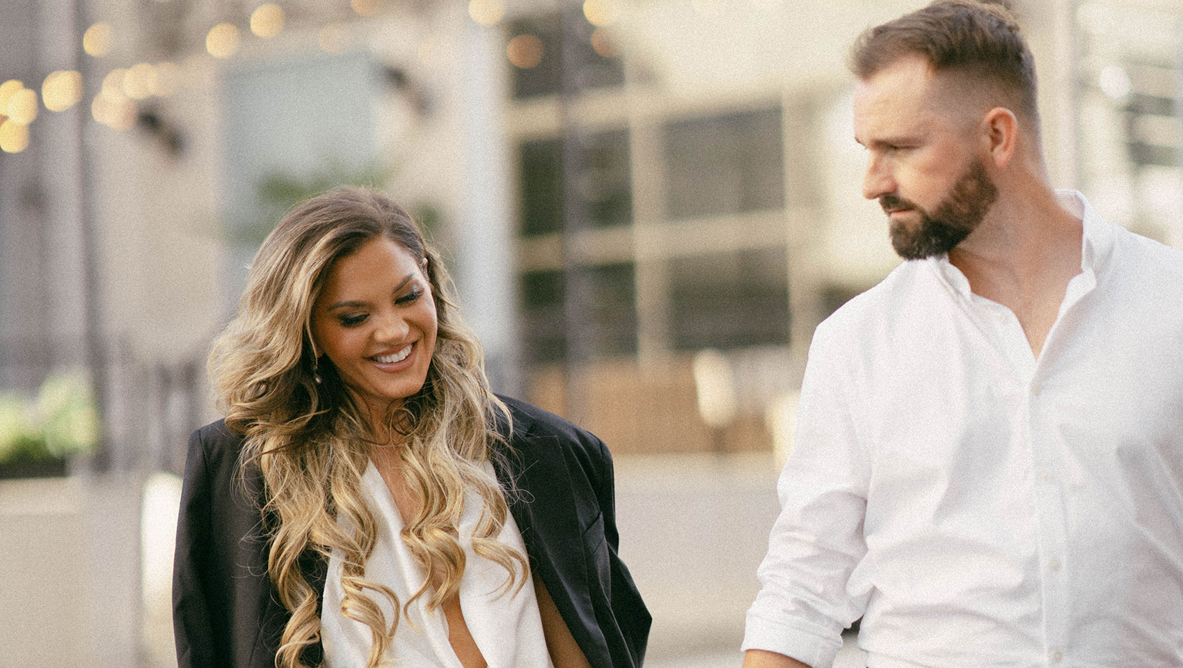 ride and groom holding hands